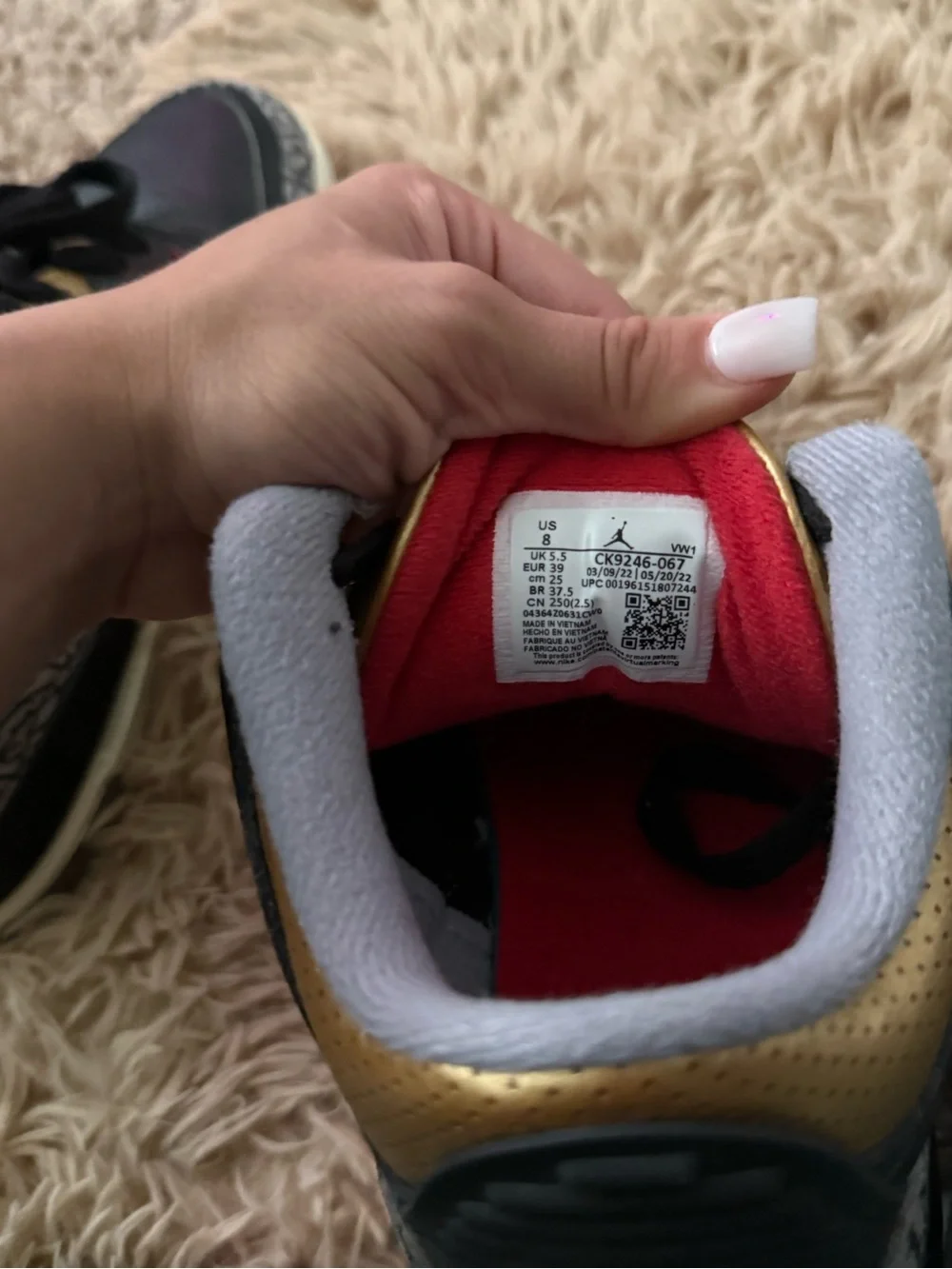 Jordan Men's Black and Gold Low-Top Sneakers with Red Accents